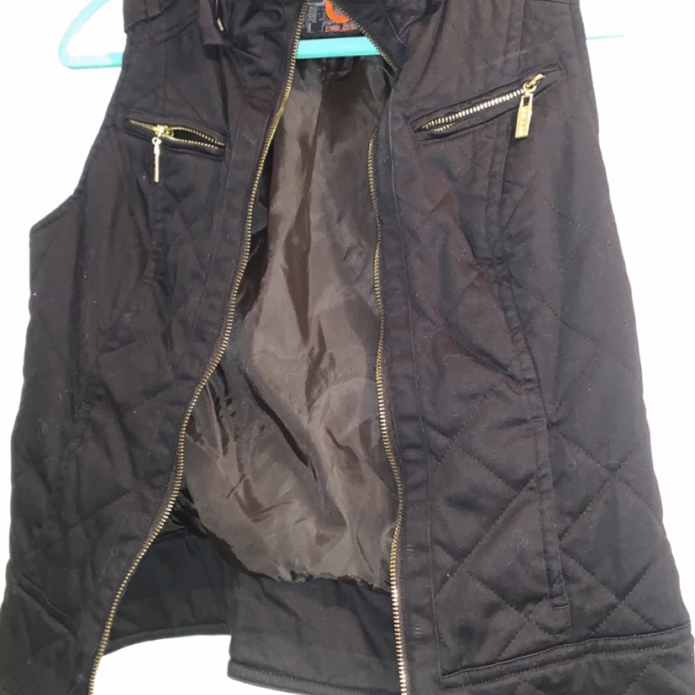 Black and gold zipper vest from GUESS